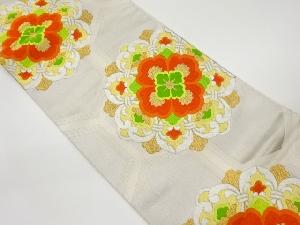 華紋に亀甲模様織出し袋帯